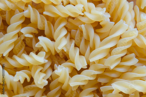 Dry pasta, background from pasta macro photography.
