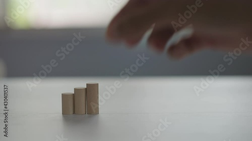 Close up wooden bars are arranged like a ladder to success