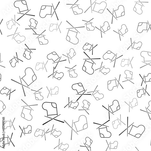 Black Knitting needles icon isolated seamless pattern on white background. Label for hand made, knitting or tailor shop. Vector