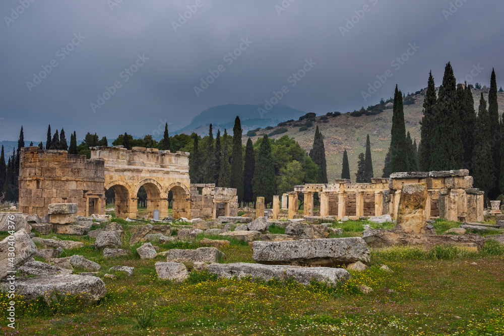 Triumphal gates in the ancient city of Hierapolis in Pamukkale Turkey on the background of mountains