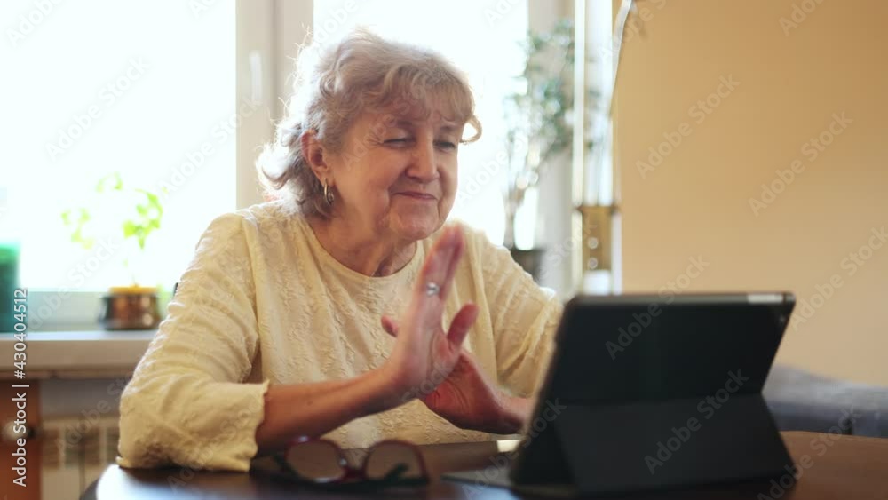 Happy senior couple using digital tablet for video call
Happy senior couple using digital tablet for video call