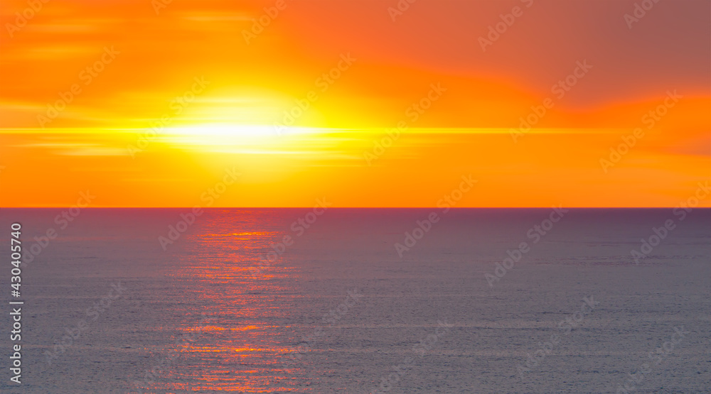 Amazing red sunset with yellow sun over the sea Amazing red sunset with yellow sun over the sea