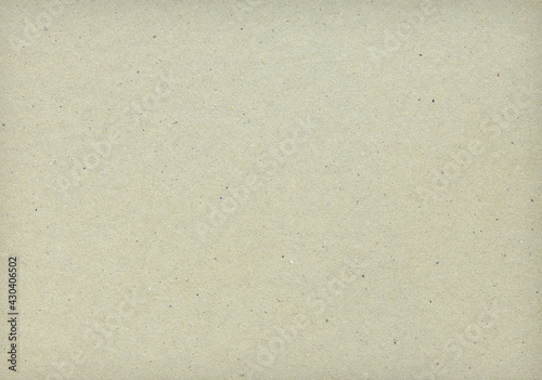 background from a sheet of recycled cardboard. Natural background. Paper texture