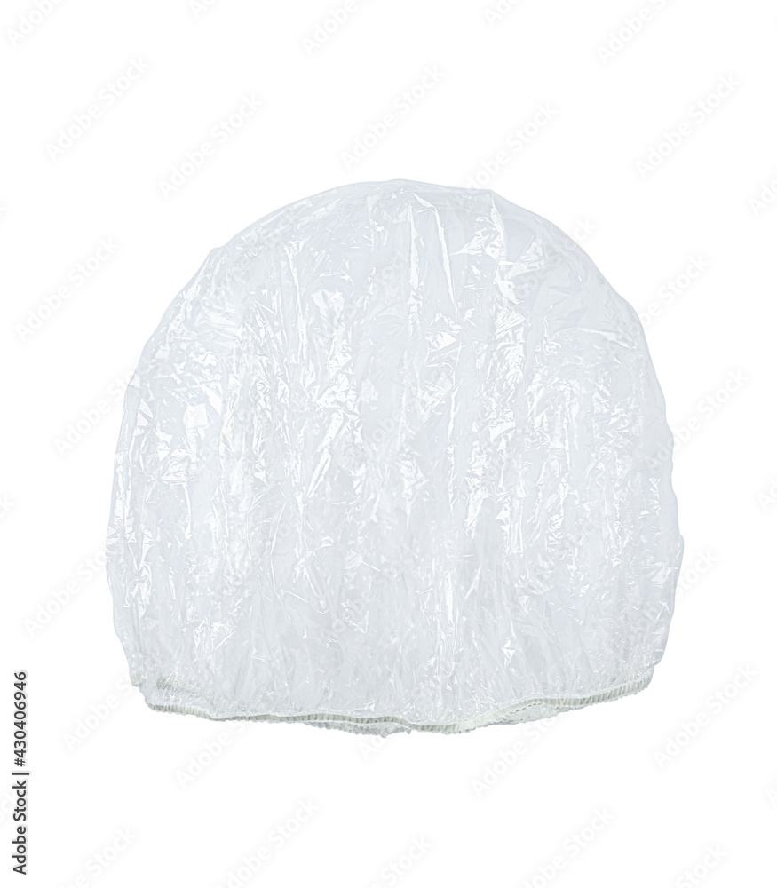 Transparent shower cap on white background, top view