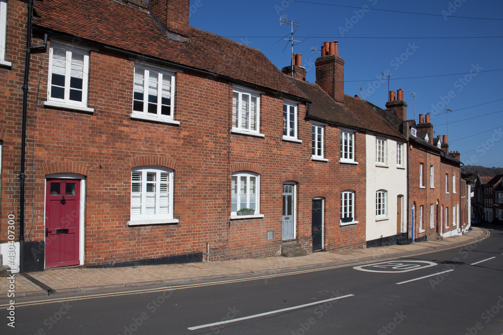 Rows of red brick houses in Henley on Thames in Oxfordshire in the UK;