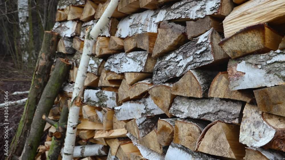 A pile of chopped birch firewood, 4k video A pile of chopped birch firewood, 4k video