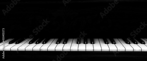 Grand piano keys close up in shadow 3d render