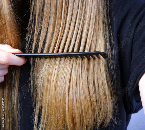 Combing your hair. Hair care.