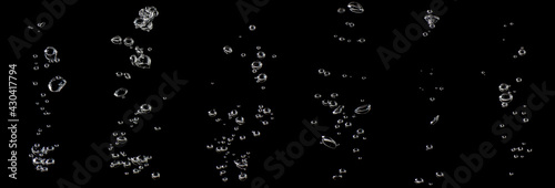 set water bubble white oxygen air, in underwater clear liquid with bubbles flowing up on the water surface, isolated on a black background photo
