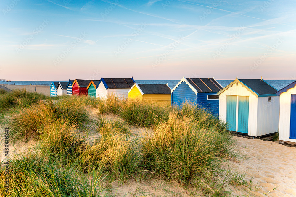 Pretty beach huts in the sand dunes Pretty beach huts in the sand dunes
