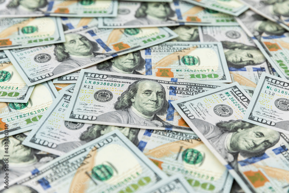 Texture with US dollars banknotes. Background of one hundred dollar Texture with US dollars banknotes. Background of one hundred dollar