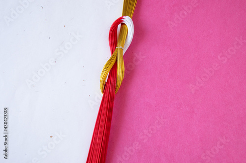 和紙と紅白と金色の水引のデザイン（ピンクと白）