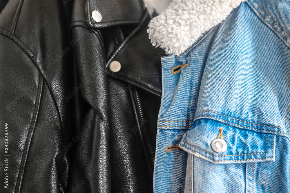 Jeans and leather jackets. Blue and black Jeans and leather jackets. Blue and black