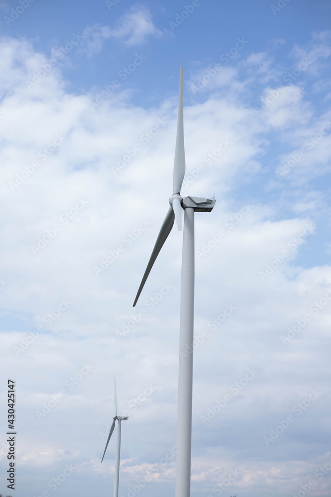 great white windmills against the blue sky, a bright saver great white windmills against the blue sky, a bright saver