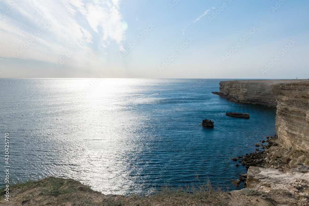 Steep banks, rocky cliffs and islands near the village of Bolshoy Atlesh on the Crimean cape Tarkhankut. Steep banks, rocky cliffs and islands near the village of Bolshoy Atlesh on the Crimean cape Tarkhankut.