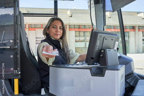 a driver woman working in bus