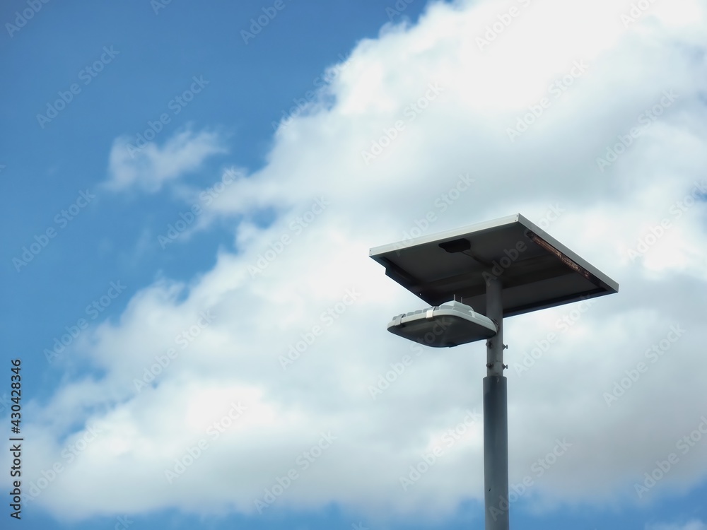 Solar cell lamp post on cloud background Solar cell lamp post on cloud background