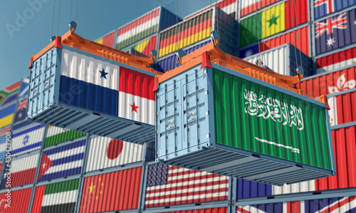 Freight containers with Panama and Saudi Arabia national flags. 3D Rendering © Marius Faust
