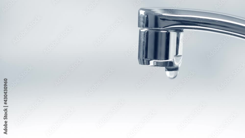 Water running from Faucet tap. Nobody. Blue tone Water running from Faucet tap. Nobody. Blue tone