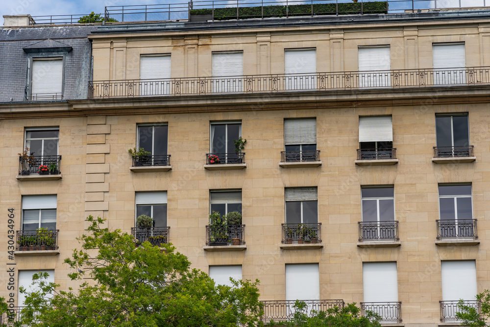 Typical window and balcony of Parisian apartment 
