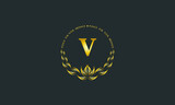 Emblem of an elegant refined monogram for heraldry of hotel, restaurant, business, presentation and much more. Vector logo illustration with letter V.