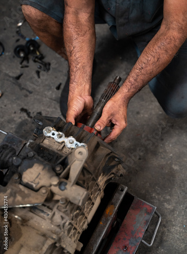 mechanics working on truck maintenance in brazil