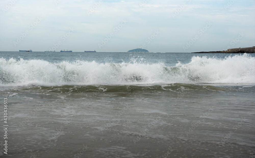Fototapeta premium Brasil, Rio de Janeiro. Ocean surf on Copacabana beach
