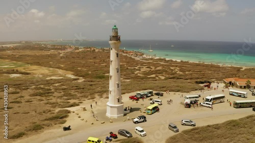 aerial image with drone from aruba lighthouse near arashi beach in the caribbean photo