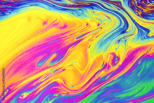 Rainbow colors. Psychedelic multi colored patterns background. Photo macro shot of soap bubbles