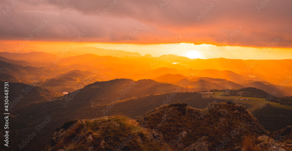 Gradient of colors in a beautiful sunset from a top of a mountain