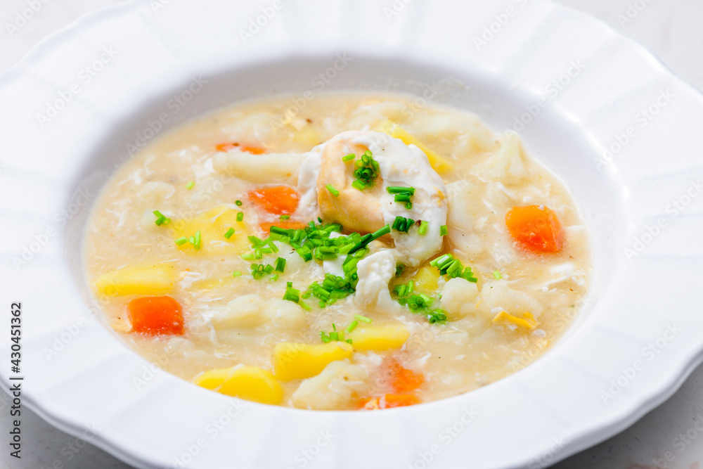 cauliflower soup with carrot, potatoes and poache egg cauliflower soup with carrot, potatoes and poache egg