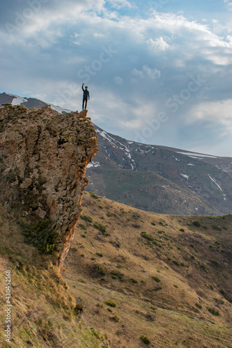 hiker on top of mountain © vardan
