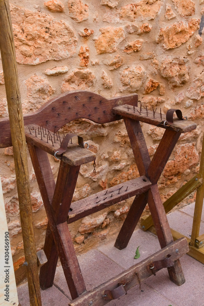 A chair used by the spanish inquisition during the middle ages - obrazy, fototapety, plakaty 