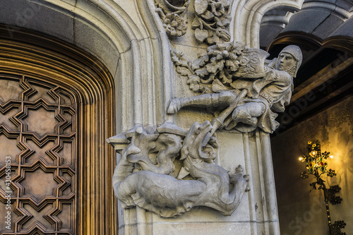 Building facade: Architectural fragments of ancient buildings in Barcelona, Spain.