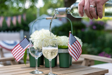 Enjoying a glass of wine in the backyard