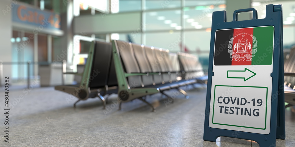 Obraz premium COVID-19 testing text and flag of Afghanistan on a sandwich board sign in the airport terminal, 3D rendering