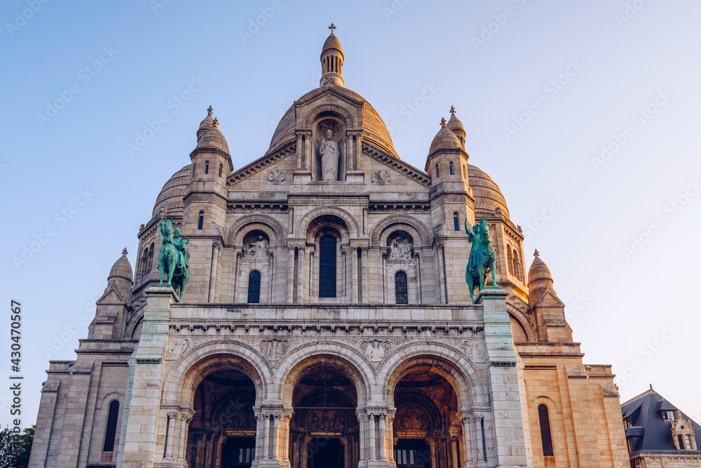 Basilica Sacre Coeur in Montmartre in Paris, France. The Basilica of the Sacred Heart (Sacre Coeur Basilica). Montmartre, Paris, France. Paris. Basilica Sacre-Coeur. On the hill Montmartre. Paris.