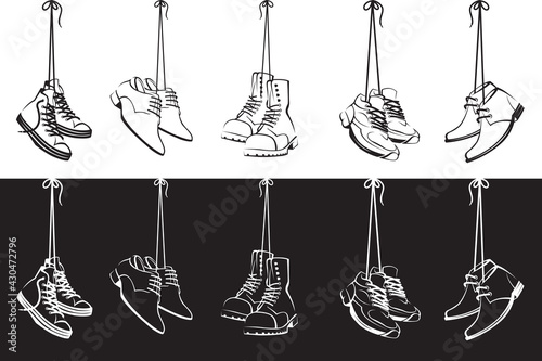collection of shoes hanging on shoelaces isolated on white and black background