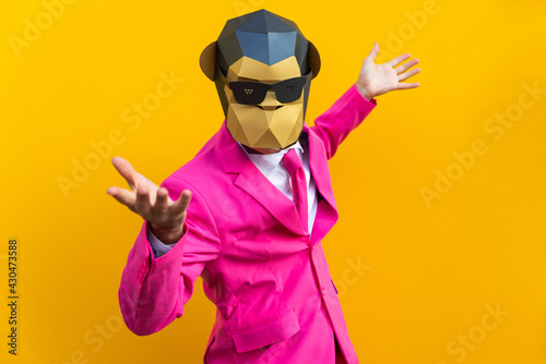 Canvas Print Man with funny low poly mask on colored background