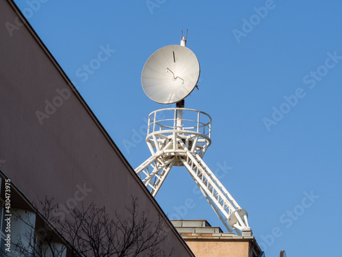 Wallpaper Mural Large satellite antenna with construction stands on a roof Torontodigital.ca