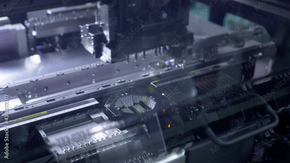 Surface Mount Technology, Smt. Automatic machine for assembling and installing SMD components. Production of electronics and circuit board. High-tech, the fourth industrial revolution. Surface Mount Technology, Smt. Automatic machine for assembling and installing SMD components. Production of electronics and circuit board. High-tech, the fourth industrial revolution.