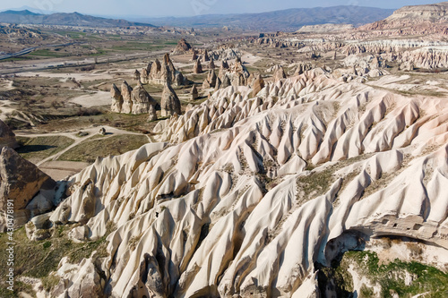 Cappadocia red or rose valley tour in Turkey, Aerial view. Amazing Cappadocia travel for creativity landscape