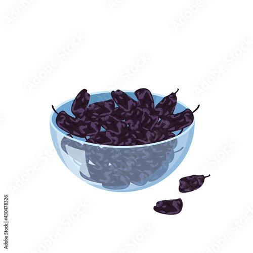 Glass transparent bowl with black raisins. Sweet delicious dessert or snack. Source of vitamins, exotic food, dried grapes. Additive to baked goods or dairy products