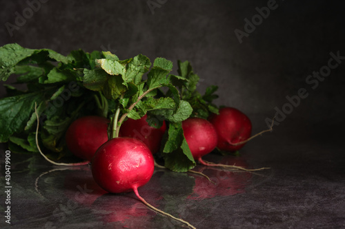 a bunch of fresh radishes on the table