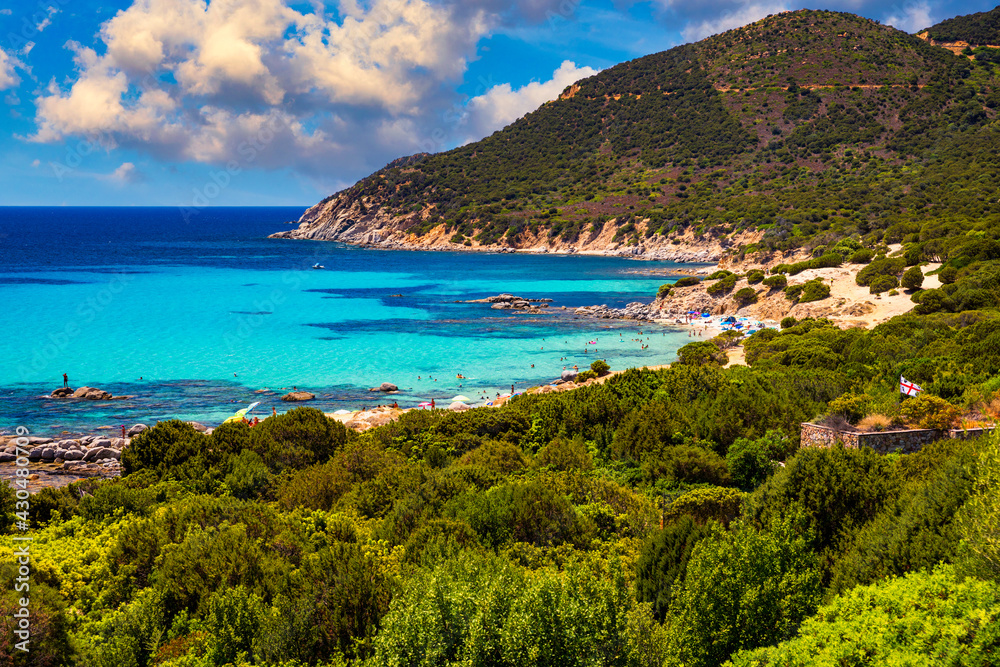 The beautiful turquoise water and white sand of Piscadeddus Beach, near Villasimius, Sardinia. The beautiful turquoise water and white sand of Piscadeddus Beach, near Villasimius, Sardinia.