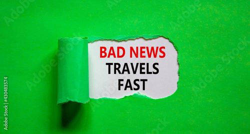 Bad news travels fast symbol. Words 'Bad news travels fast' appearing behind torn green paper. Business and bad news travels fast quote concept. Copy space.