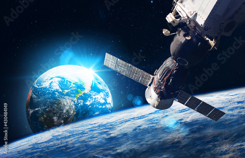 Fototapeta Naklejka Na Ścianę i Meble -  Space   station on orbit of the Earth planet and universe background. Elements of this image furnished by NASA