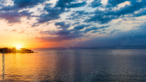 Sunset or sunrise sky above the sea. Nature  weather  atmosphere  travel theme. Sunrise or sunset over the sea. Panorama