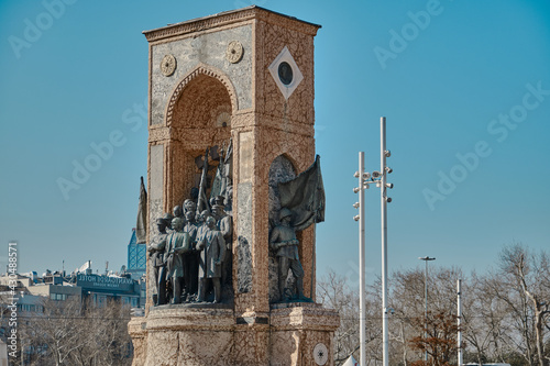 Turkey istanbul 04.03.2021. Taksim square and republic monument (cumhuriyet aniti) at the end of istiklal avenue with sculpture details established during early stage of turkish republic photo