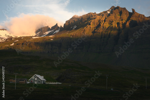 sunrise over the mountains and nordic style house